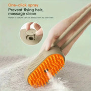 Pet Cleaning Spray Comb for dogs and cats, orange bristles, one-click spray feature.